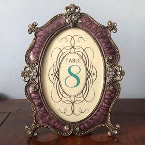 Metal and enamel picture frame